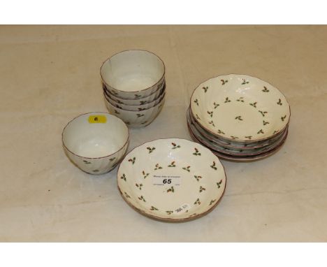 A set of five 19th Century New Hall style floral decorated tea bowls and saucers of wrythen design