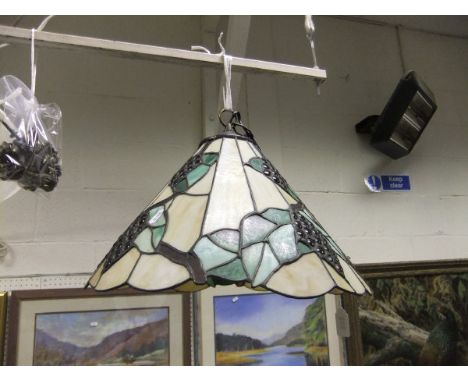 A frosted milk glass plafonnier with brass chained fitments, together with a Tiffany style ceiling light fitting of conical f