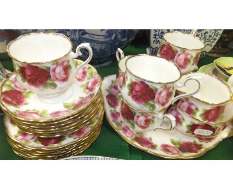 A Royal Albert "Old English Rose" teaset comprising 6 cups, saucers and side plates, a cake plate, milk jug and sugar bowl