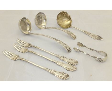 A Victorian silver Kings pattern sauce ladle (by WC, Edinburgh 1856), a silver sifter spoon with engraved scrolling decoratio