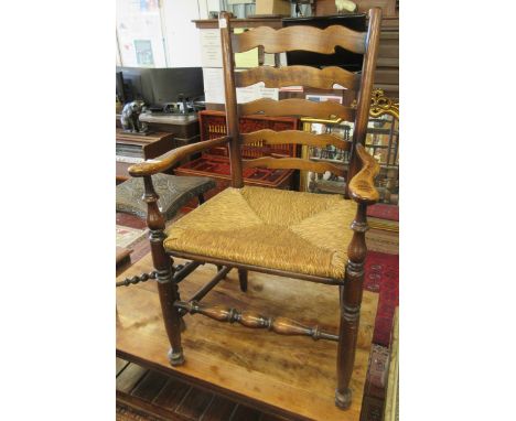 Antique rush seated ladder back chair 