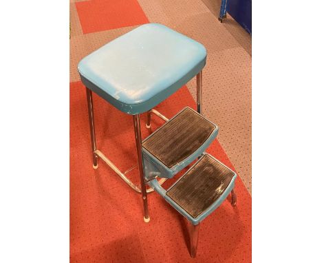 A 1960s Prestige step stool, having fold out two step, chrome plated tubular steel with sky blue vinyl seat, H62cm.