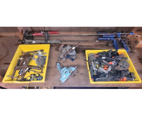 A collection of clamps to include plastic spring glamps, 'G' clamps, bench clamps, six Record sash clamps, also a Swordfish b