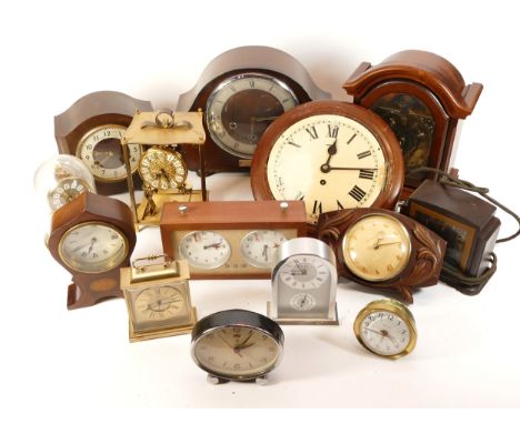 A collection of mid twentieth-century and later mantel clocks, wall and carriage clocks, to include, a 1950s Smiths clock fea