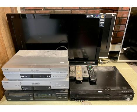 A Panasonic Viera LCD TV, model TX L32-G10B, together with a Panasonic TX-26LXD70 TV, a Panasonic VHS/DVD combi player DMR-EZ