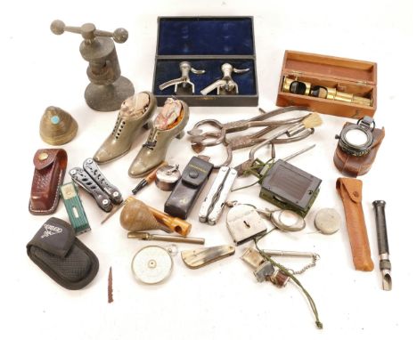 An assortment of collectable items, to include, three field compasses, Gerber and Leatherman multi-tools, a field microscope,