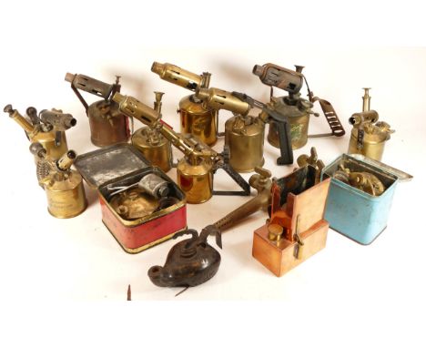 A collection of blowtorches and stoves, to include, a Bahco Primus camp stove, two keg taps, stove spares and service tools, 