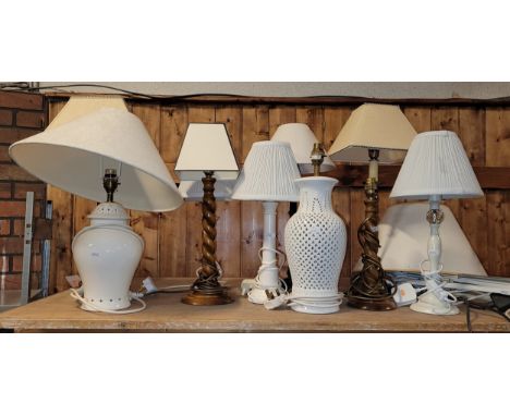 A selection of ten modern table lamps of various styles, to include ceramic, turned wood and burnished metal examples, comple