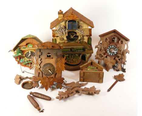 A collection of mid-twentieth century Black Forest cuckoo clocks, having single and twin train manual wind movement, suitable