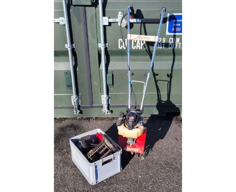 A Mantis hand tiller/rotavator, with Honda petrol engine, together with a box of accessories.