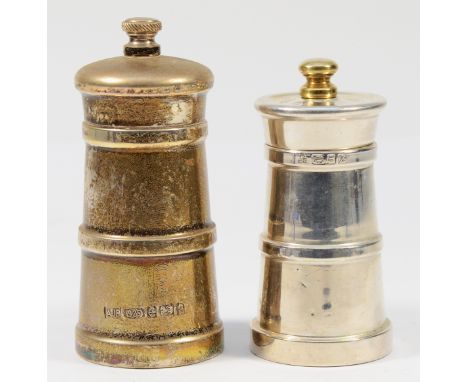 A silver pepper grinder, London 1997, together with another silver pepper grinder, Birmingham 2002, tallest 11cm (2)