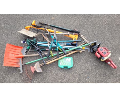 A sovereign petrol hedge trimmer, a VonHaus 240v patio weed sweeper, two lawn edging spades, a shovel, two rakes, a folk, pla