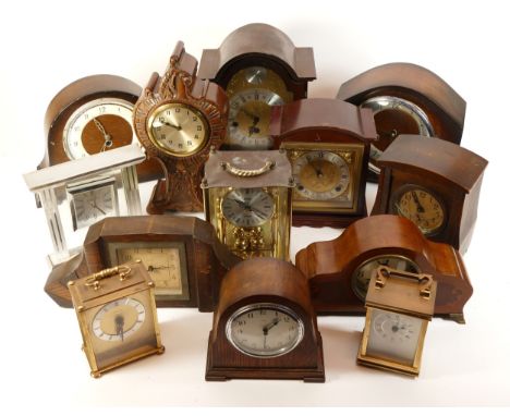 A collection of mid twentieth-century and later mantel clocks, wall and carriage clocks, to include, a Taylor and Bligh carri