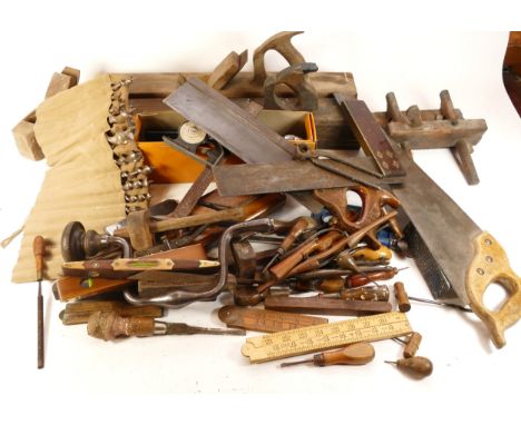 An assortment of carpenters tools, to include, a Stanley drill, a bow saw, and a quantity of planes, housed in two boxes. (2)