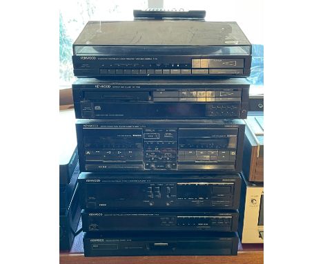 A Kenwood Hi-Fi music stack system, comprising turntable P-7X, a compact disc player DP-7700, cassette deck X-7WX, amplifier 