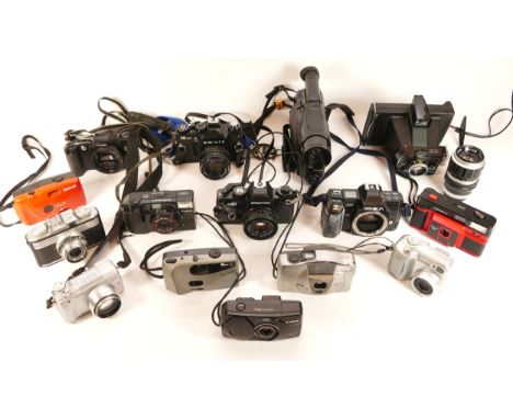 A collection of cameras and camera accessories, to include, a Canon EOS Rebel X S, a Minolta 7000, a Praktica BX20, and a Pan