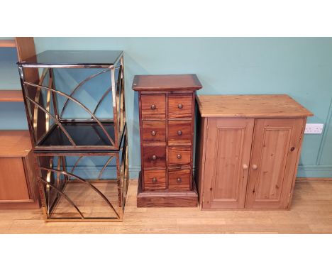 A modern free standing pine cabinet, having double panelled cupboard doors opening to an adjustable shelf, W71, D45, H76cm, t