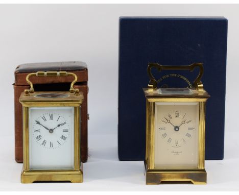 An early twentieth century brass cased carriage clock, housing an eight day movement, complete with traveling case, together 
