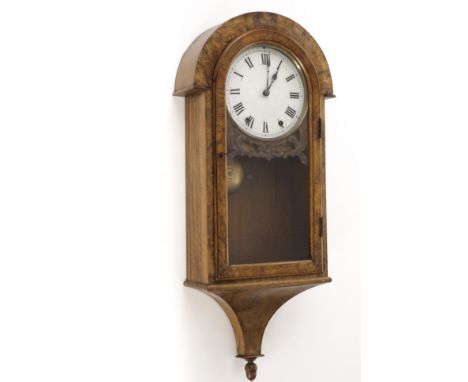 A late 19th century walnut wall clock, having eight day twin chain movement and hour striking, white enamel dial on replace b