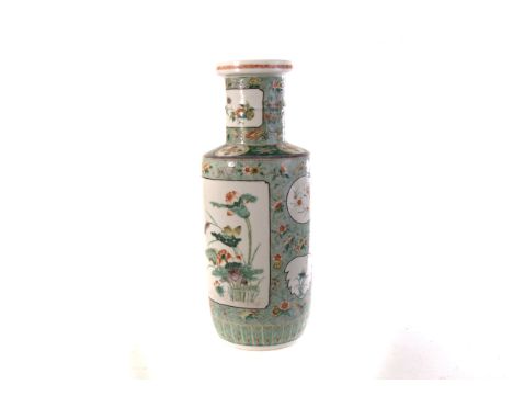 A 19th century Chinese ceramic vase, in the Canton style, with florally decorated panels, approx 35cm H