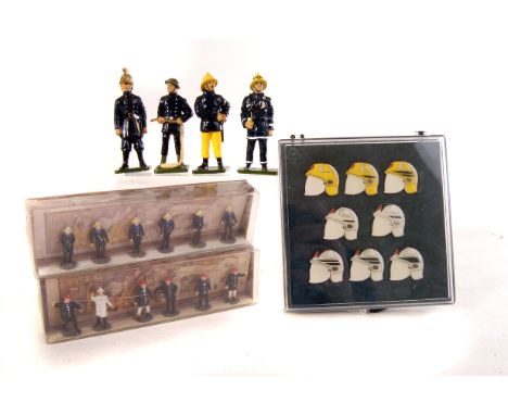 Four lead figures of firemen through the ages, 1930s-90s, together with two smaller sets of fireman figures, a cased set of e