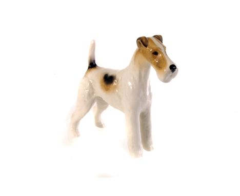 A Beswick ceramic figure of a Fox Terrier, marked to belly 'Tavanera Romulus'