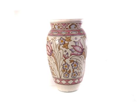 A Bursley ware Charlotte Rhead ovoid pottery vase, decorated with violet and pink floral design, marked to base TL76