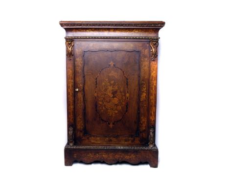 A 19th century walnut and marquetry cabinet, having inlaid floral decoration to front, with applied decorative brass fittings