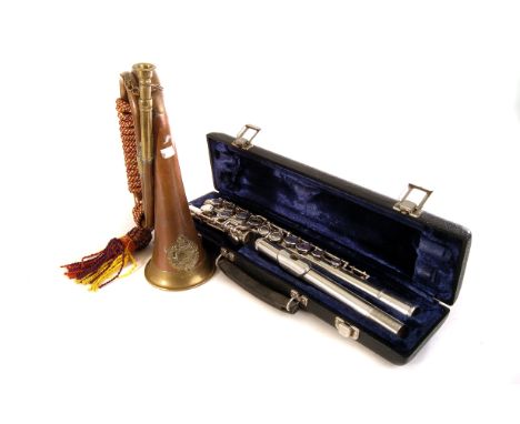A copper and brass bugle, having Western Australian University Regiment badge to front, together with a vintage flute marked 
