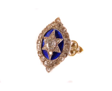 A 9ct gold, diamond and enamel ring, having central cushion cut stone with smaller stones forming a star above blue enamel ov