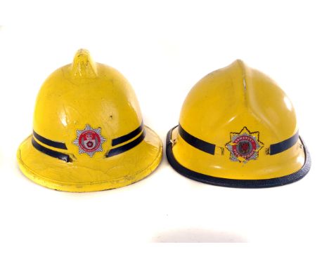 Four vintage British fire helmets, to include a Royal Berkshire fire fighter helmet, a Hampshire sub-officer fire helmet, a S