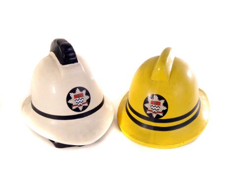 A vintage London Fire Brigade Station Officers fire helmet, together with a London Fire Brigade Sub-Officers fire helmet, pos