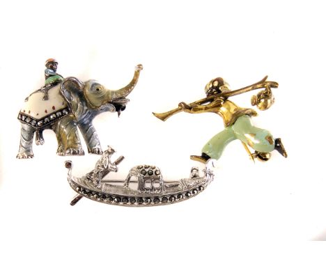 Two enamel brooches, circa 1930s, of Eastern/Indian subject matter, together with a 800 grade silver and marcasite gondola br