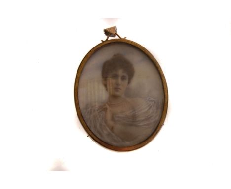 An ivory portrait miniature, depicting a young lady dressed in lace and pearls, in yellow metal frame and hanging loop