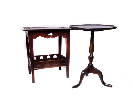 A Celtic Arts & Crafts carved oak table, the top having carved Celtic designed border, with lower galleried shelf with invert