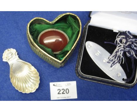 Silver and agate oval box/brooch in heart shaped box, together with silver bookmark in box and silver shell design tea caddy.