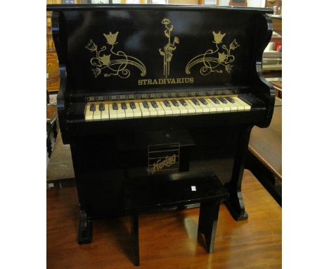 Modern Hering Stradivarius miniature child's piano and stool.(B.P. 24% incl. VAT)