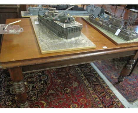 Early 20th Century oak table on ring turned and fluted legs with ceramic castors.(B.P. 24% incl. VAT)