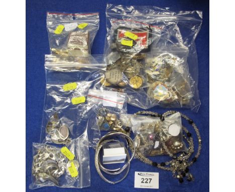 Bag of assorted costume jewellery etc to include: various enamel badges; bangles; beads; silver chain; dress rings; cruciform