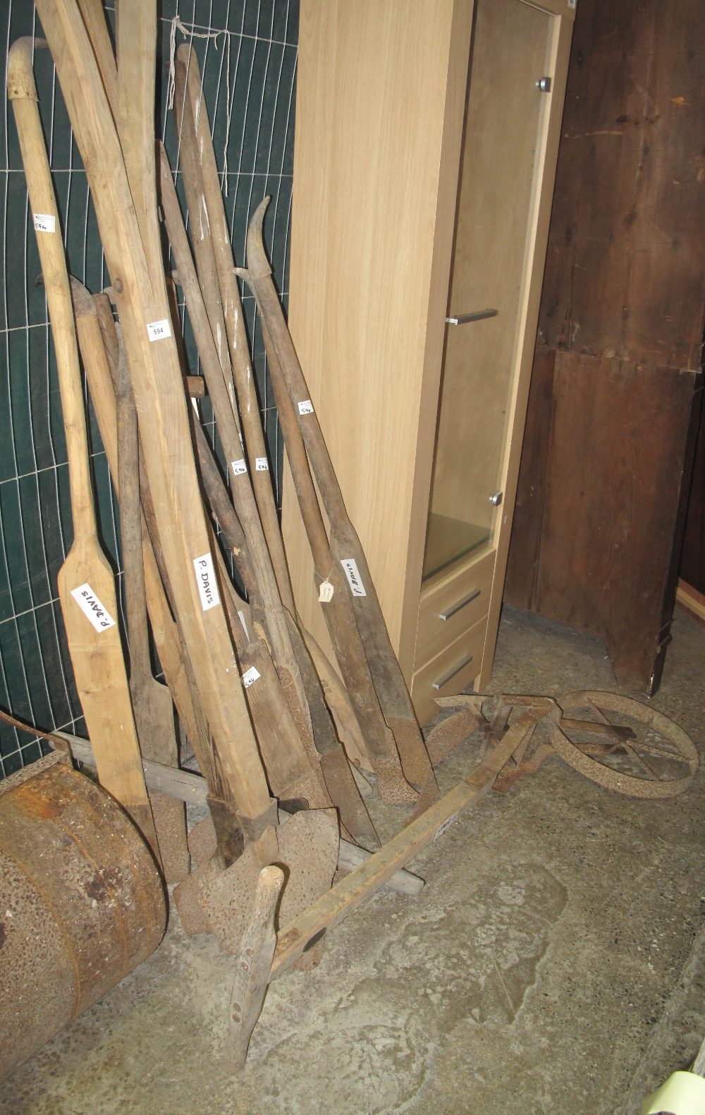Large collection of traditional peat cutting tools, some with horn