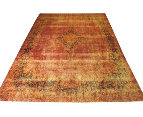 VINTAGE KERMAN CARPET, 407cm x 294cm, in shades of coquelicot.