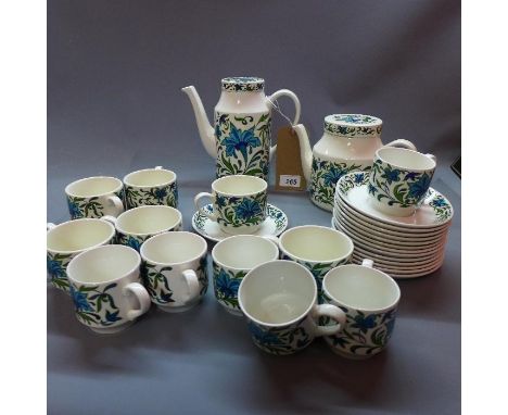 A mid winter ceramic tea set with Spanish garden pattern. 