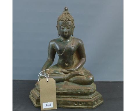 An early 20th century Chinese bronze statue of Buddha. 