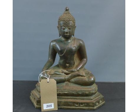 An early 20th century Chinese bronze statue of Buddha. 