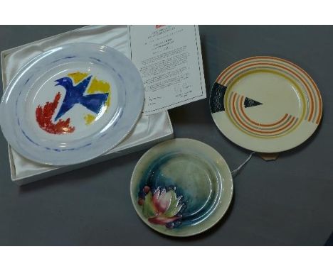 A Moorcroft side plate, marked and bearing label to base, 7cm diameter, together with a boxed Royal Crown Derby limited editi