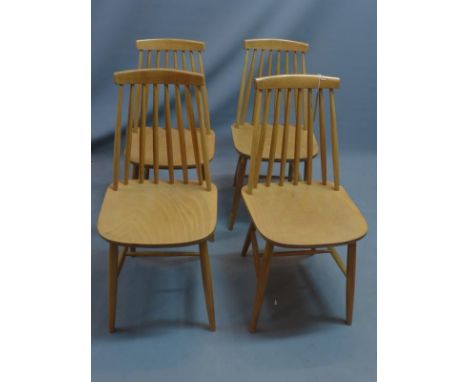 A set of four Ercol style dining chairs. 