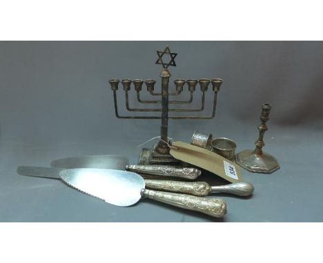 A silver Menorah, having Star of David finial, bears makers mark for A. Taite & Sons Ltd, London, H.20cm, together with a sil
