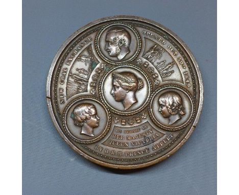 A Victorian bronze medal by B. Wyon, Commemorating the opening of the New Coal Exchange, 1849, four busts in medallions, the 