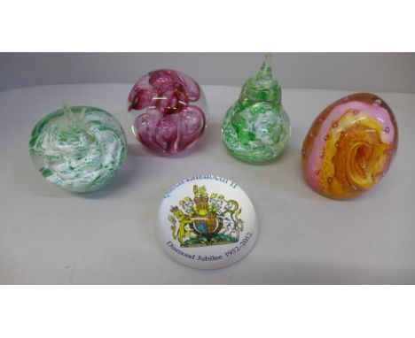 Four Caithness glass paperweights and a Queen Elizabeth II Diamond Jubilee paperweight, boxed 