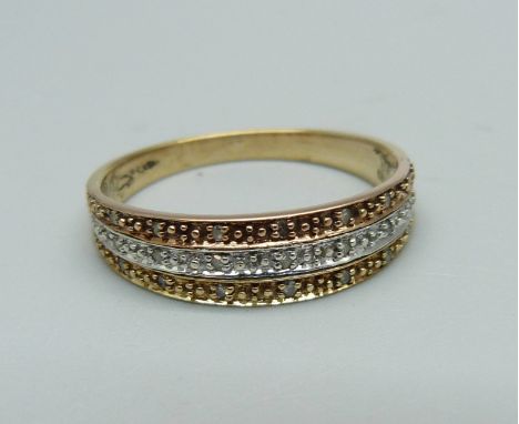 A 9ct gold, three row diamond ring, 2.9g, U 